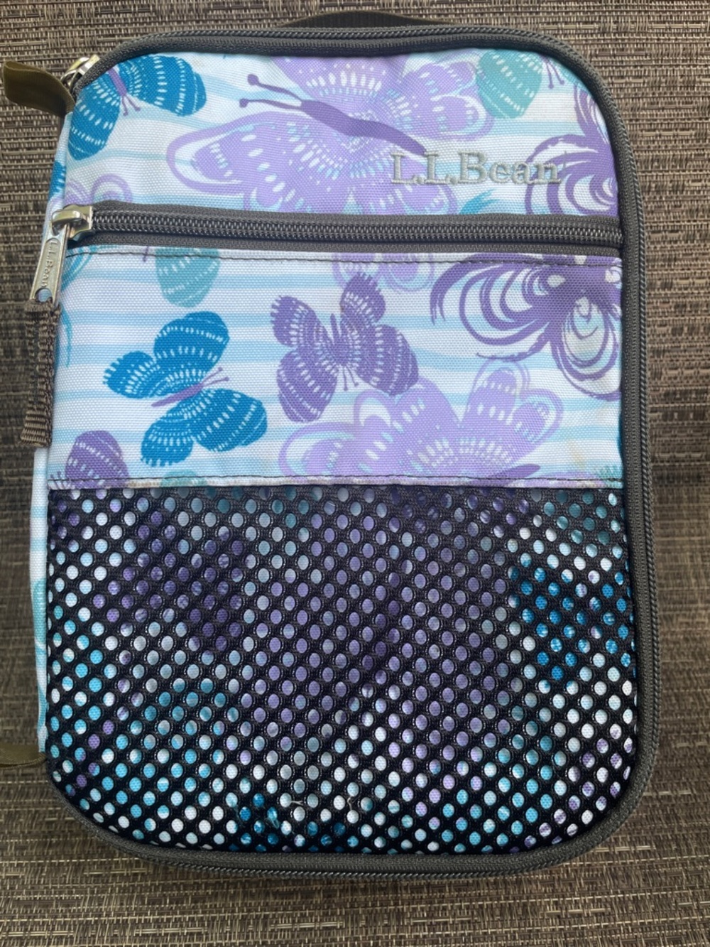 L.L.Bean lunch box features a vibrant purple and blue butterfly pattern Nice!